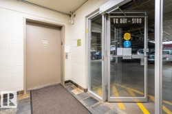 Elevator access to the parkade.  Nice bright open spaces. - 