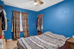Textured blue walls with a single window - 