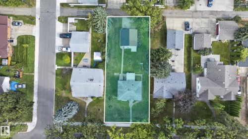 Expansive lot featuring a main residence, detached garage, and mature landscaping - 12345 79 Street Nw, Edmonton, AB 