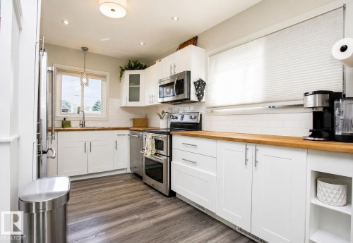 12231 55 Street Nw, Edmonton, AB - Indoor Photo Showing Kitchen With Stainless Steel Kitchen
