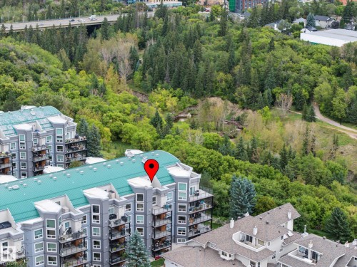Multi-story building featuring balconies and a green roof - #505 7839 96 St Nw, Edmonton, AB 