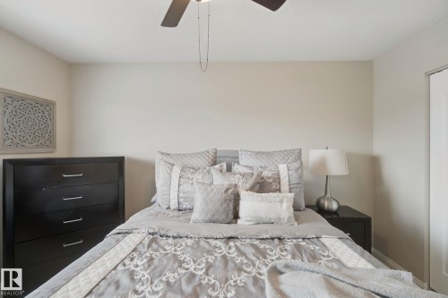 Neutral wall color, ceiling fan, white door, and recessed lighting - 13912 156 Avenue Nw, Edmonton, AB 