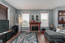 #301 8108 109 St Nw, Edmonton, AB  - Indoor Photo Showing Living Room With Fireplace 