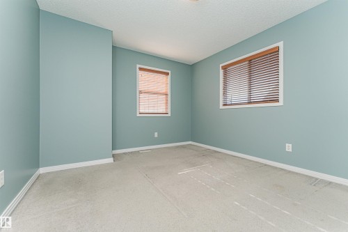 Window with horizontal blinds - 1254 Mcallister Way Sw, Edmonton, AB 