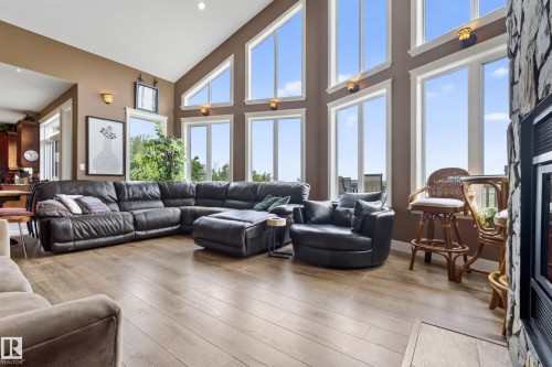 Expansive living area with vaulted ceilings and abundant natural light - 48109 Rr 155, Rural Beaver County, AB - Indoor Photo Showing Living Room