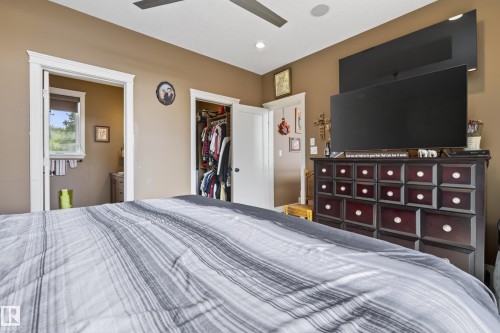 Bedroom featuring a ceiling fan, recessed lighting, and a neutral wall color - 48109 Rr 155, Rural Beaver County, AB - Indoor Photo Showing Bedroom