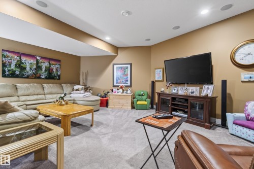 Spacious recreational area featuring recessed lighting and wall-to-wall carpeting - 48109 Rr 155, Rural Beaver County, AB - Indoor Photo Showing Living Room