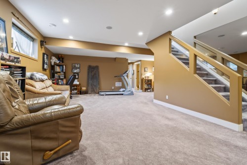 Spacious lower level featuring light-colored carpeting and recessed lighting - 48109 Rr 155, Rural Beaver County, AB - Indoor