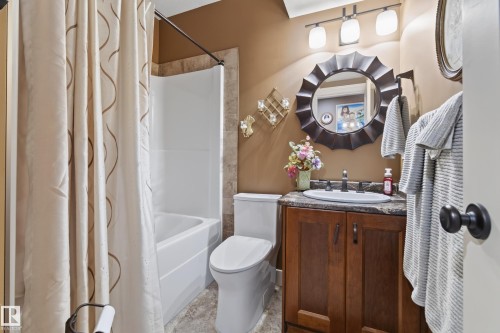 Full bathroom featuring a single white tub and shower combination with a tiled surround - 48109 Rr 155, Rural Beaver County, AB - Indoor Photo Showing Bathroom