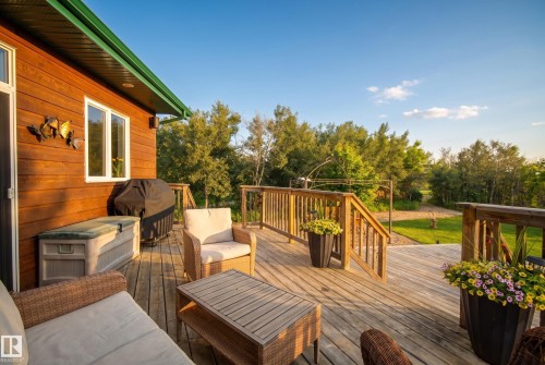 Spacious wood deck with natural wood railings - 48109 Rr 155, Rural Beaver County, AB - Outdoor With Deck Patio Veranda With Exterior