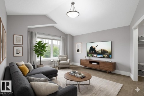 Vaulted ceiling, recessed window, natural light, wall-mounted television, built-in shelving - 886 Armitage Wynd Sw, Edmonton, AB 