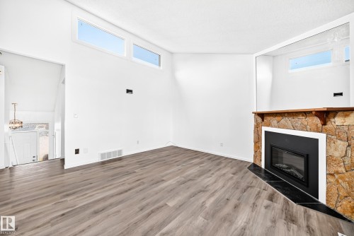 14141 26 Street Nw, Edmonton, AB - Indoor With Fireplace