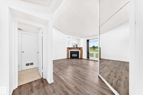 14141 26 Street Nw, Edmonton, AB - Indoor With Fireplace