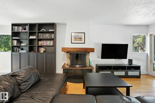 5406 110 Street Nw, Edmonton, AB - Indoor Photo Showing Living Room With Fireplace