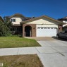 Brick and siding exterior with an arched entry - 11022 158 Avenue Nw, Edmonton, AB 
