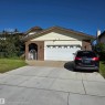 Brick and siding exterior with an arched entry - 11022 158 Avenue Nw, Edmonton, AB 