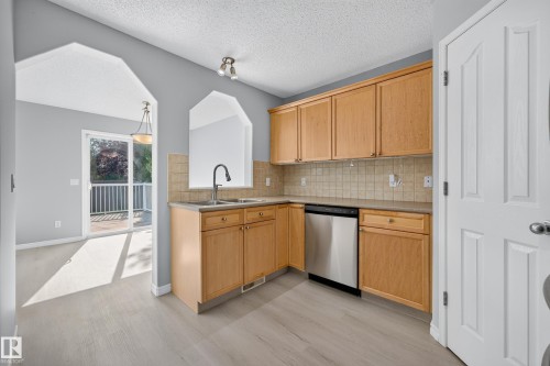 1103 117 Street Sw, Edmonton, AB - Indoor Photo Showing Kitchen With Double Sink