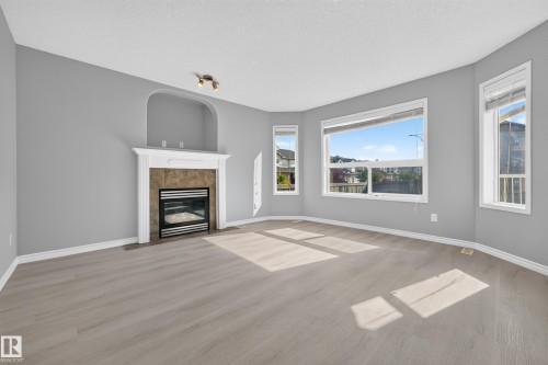 1103 117 Street Sw, Edmonton, AB - Indoor Photo Showing Living Room With Fireplace