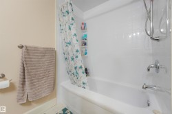 Upstairs 4 Piece Bathroom featuring additional above toilet shelving unit. - 
