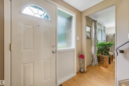 Front entry way inside the home. When you walk in to the left there is mud room space for shoes and coat. Living room space to the right features open concept living area with dining room and kitchen. - 267 Ridgewood Terrace, St. Albert, AB - Indoor Photo Showing Other Room