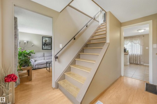 Front entry way inside the home. When you walk in to the left there is mud room space for shoes and coat. Living room space to the right features open concept living area with dining room and kitchen. - 267 Ridgewood Terrace, St. Albert, AB - Indoor Photo Showing Other Room