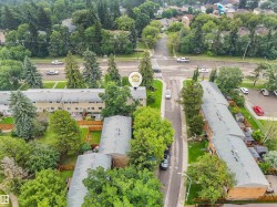 Aerial image of the homes location. It is close by the covered parking structure, and has visitor parking just off to the side. - 
