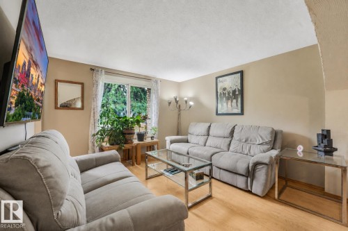 Living room space features open concept living area with dining room and kitchen. - 267 Ridgewood Terrace, St. Albert, AB - Indoor Photo Showing Living Room