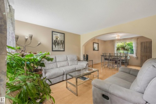 Living room space features open concept living area with dining room and kitchen. - 267 Ridgewood Terrace, St. Albert, AB - Indoor Photo Showing Living Room