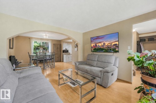 Living room space features open concept living area with dining room and kitchen. - 267 Ridgewood Terrace, St. Albert, AB - Indoor Photo Showing Living Room