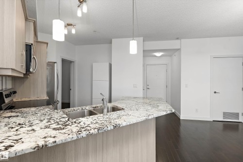 #109 10523 123 St Nw, Edmonton, AB - Indoor Photo Showing Kitchen With Double Sink With Upgraded Kitchen