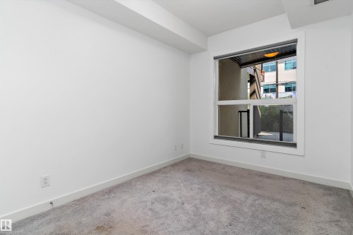 #109 10523 123 St Nw, Edmonton, AB - Indoor Photo Showing Other Room