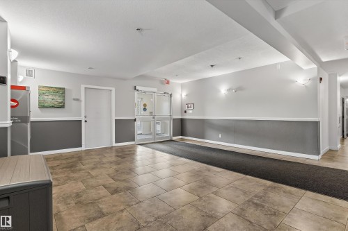 #109 10523 123 St Nw, Edmonton, AB - Indoor Photo Showing Other Room