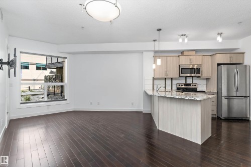 #109 10523 123 St Nw, Edmonton, AB - Indoor Photo Showing Kitchen With Stainless Steel Kitchen With Upgraded Kitchen