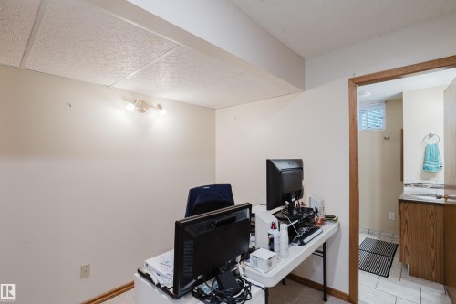 Recessed panel ceiling with track lighting - 10924 35A Avenue Nw, Edmonton, AB 