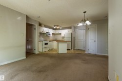 Open-concept living area with integrated kitchen - 
