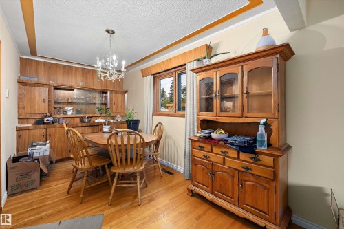 Wood-finish flooring with a built-in wall unit - 10621 60A Avenue Nw, Edmonton, AB 