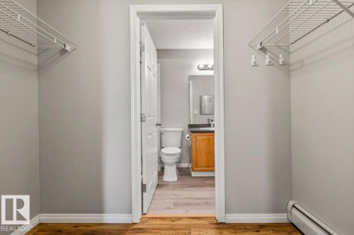 Spacious walk-in closet with wire shelving - #110 4309 33 St, Stony Plain, AB 