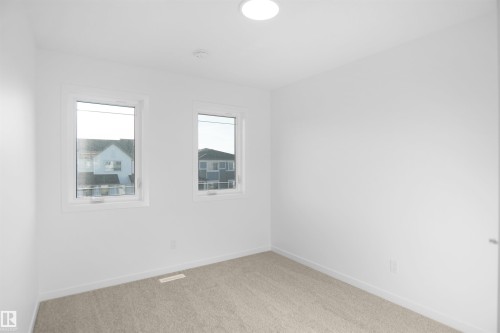 5115 Parc Reunis Way, Beaumont, AB - Indoor Photo Showing Other Room