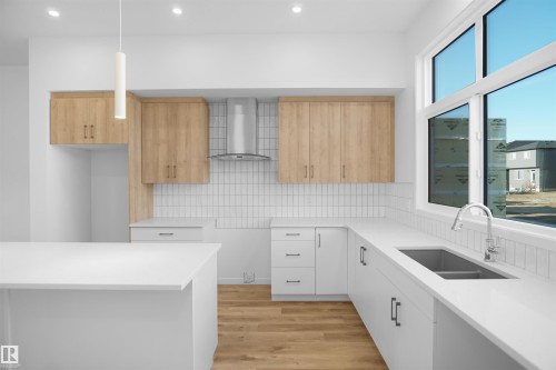 5115 Parc Reunis Way, Beaumont, AB - Indoor Photo Showing Kitchen With Double Sink