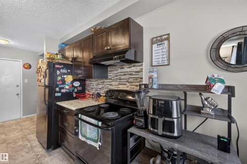 #102 14520 52 St Nw, Edmonton, AB - Indoor Photo Showing Kitchen