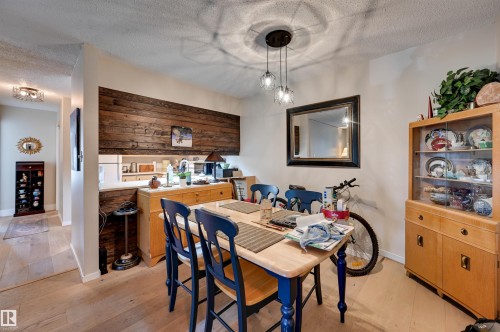 Wood-finish flooring throughout - #203 24 Alpine Pl, St. Albert, AB 