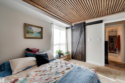 Wood slat ceiling with exposed beams - #203 24 Alpine Pl, St. Albert, AB 