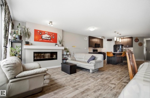 3805 Powell Wynd Sw, Edmonton, AB - Indoor Photo Showing Living Room With Fireplace