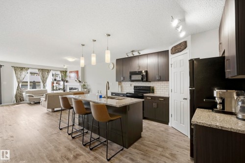 3805 Powell Wynd Sw, Edmonton, AB - Indoor Photo Showing Kitchen With Upgraded Kitchen