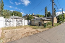 Detached garage with a shingle roof - 