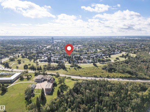 Expansive urban landscape featuring dense residential areas and substantial green spaces - 8743 Strathearn Drive Nw, Edmonton, AB 