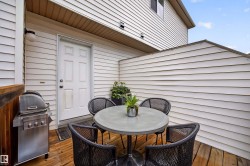 Outdoor wooden deck with privacy wall - 
