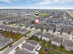 Established suburban neighborhood featuring detached homes with private fenced yards - 