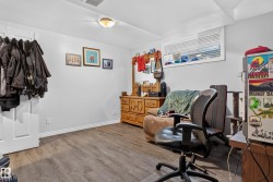 Wood-finish flooring throughout the space - 