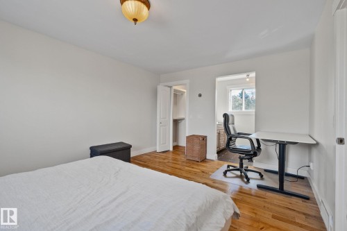 Hardwood flooring, recessed lighting, and a closet with bifold doors - 12403 29A Avenue Nw, Edmonton, AB 